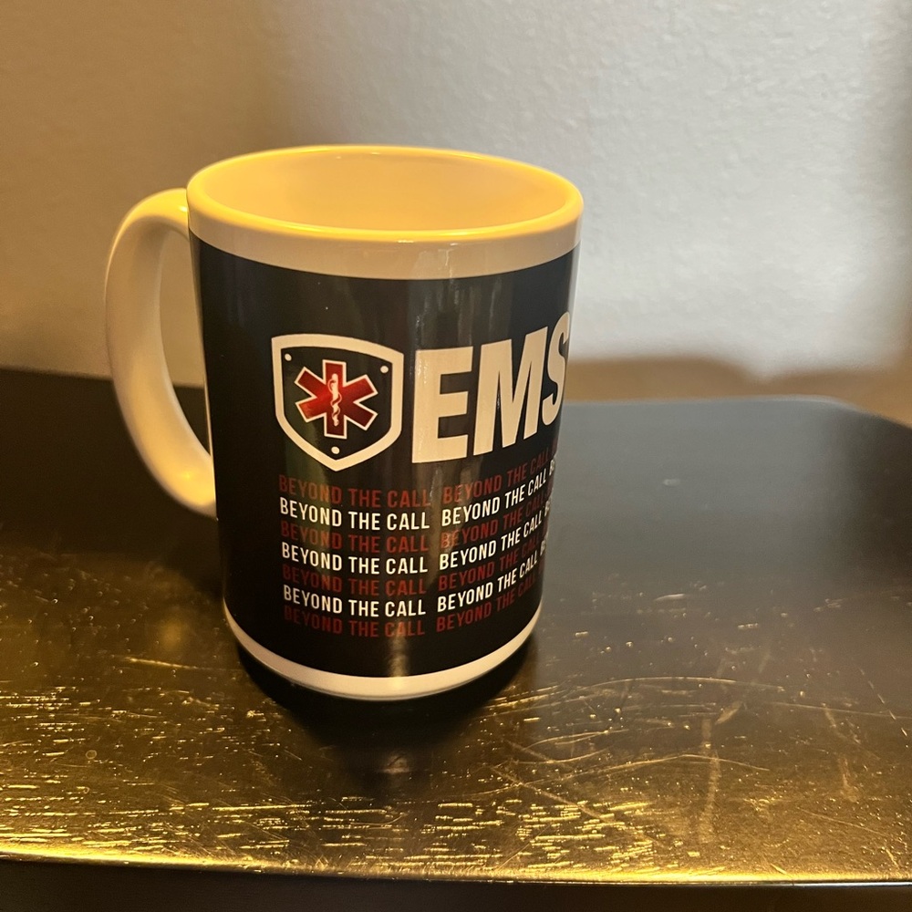 EMS “Beyond The Call” Black and White Coffee Mug